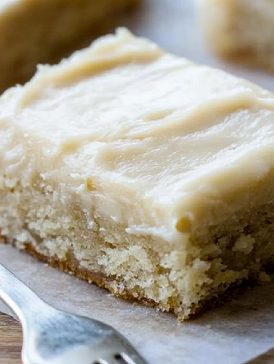 A piece of cake on a plate.