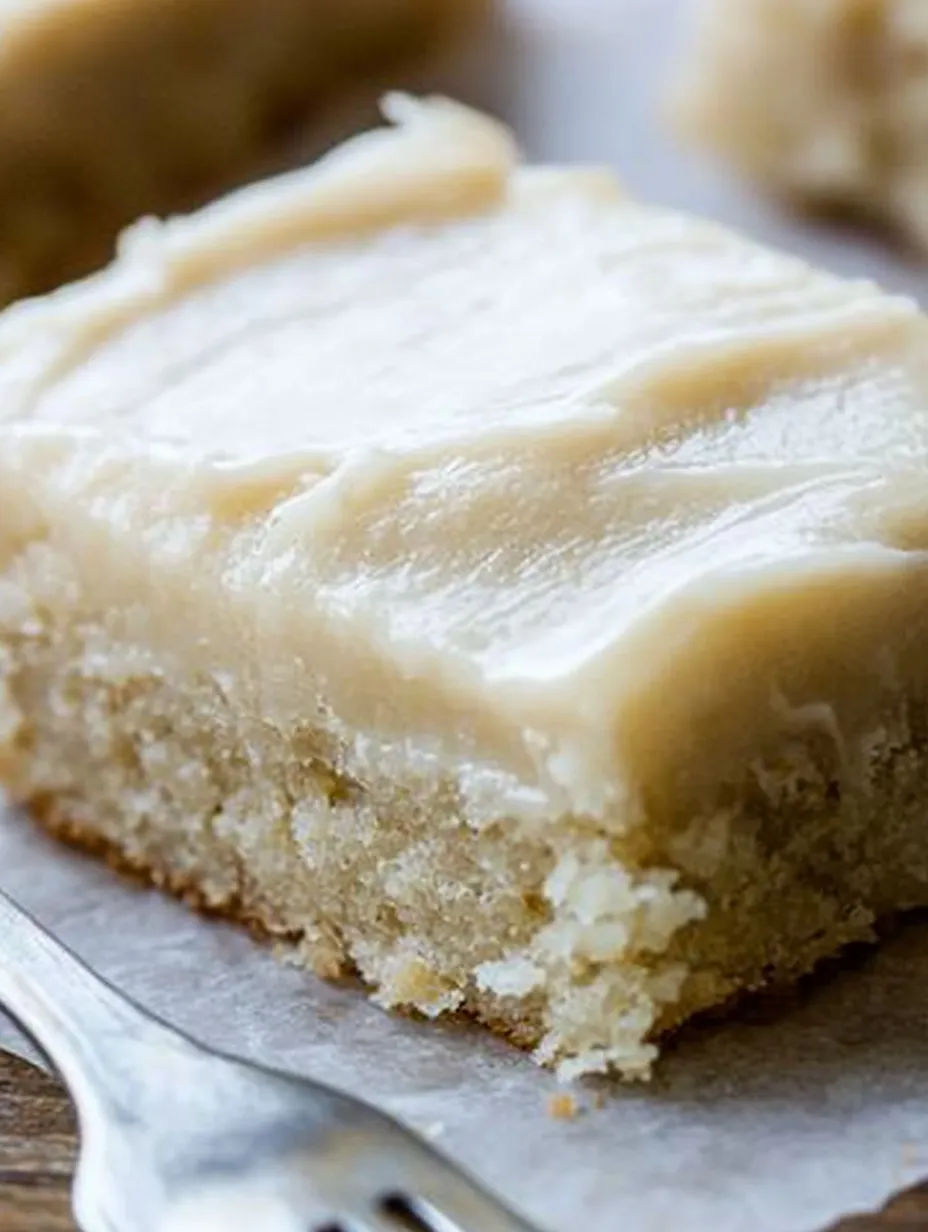 A piece of cake on a plate.