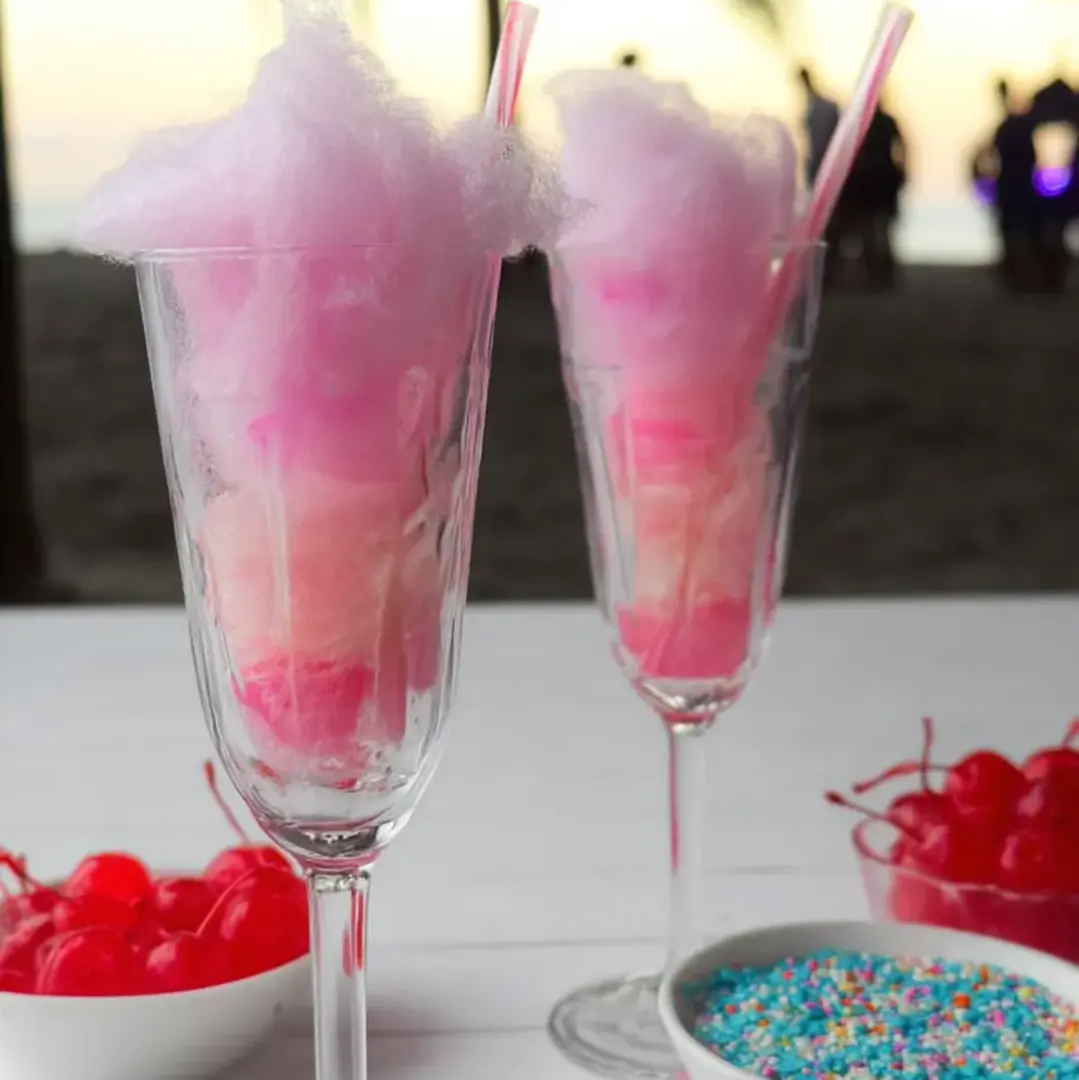 Two glasses of pink cotton candy.