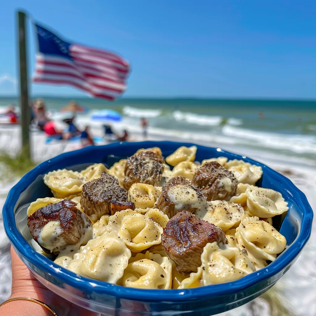 A blue bowl filled with pasta and meat.