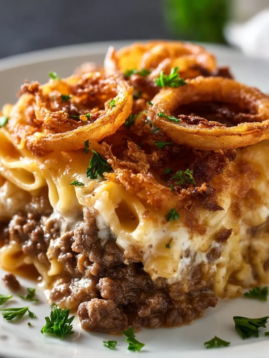 A plate of food with a piece of meat and onions.