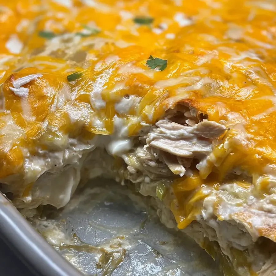 A slice of pizza with cheese and chicken.