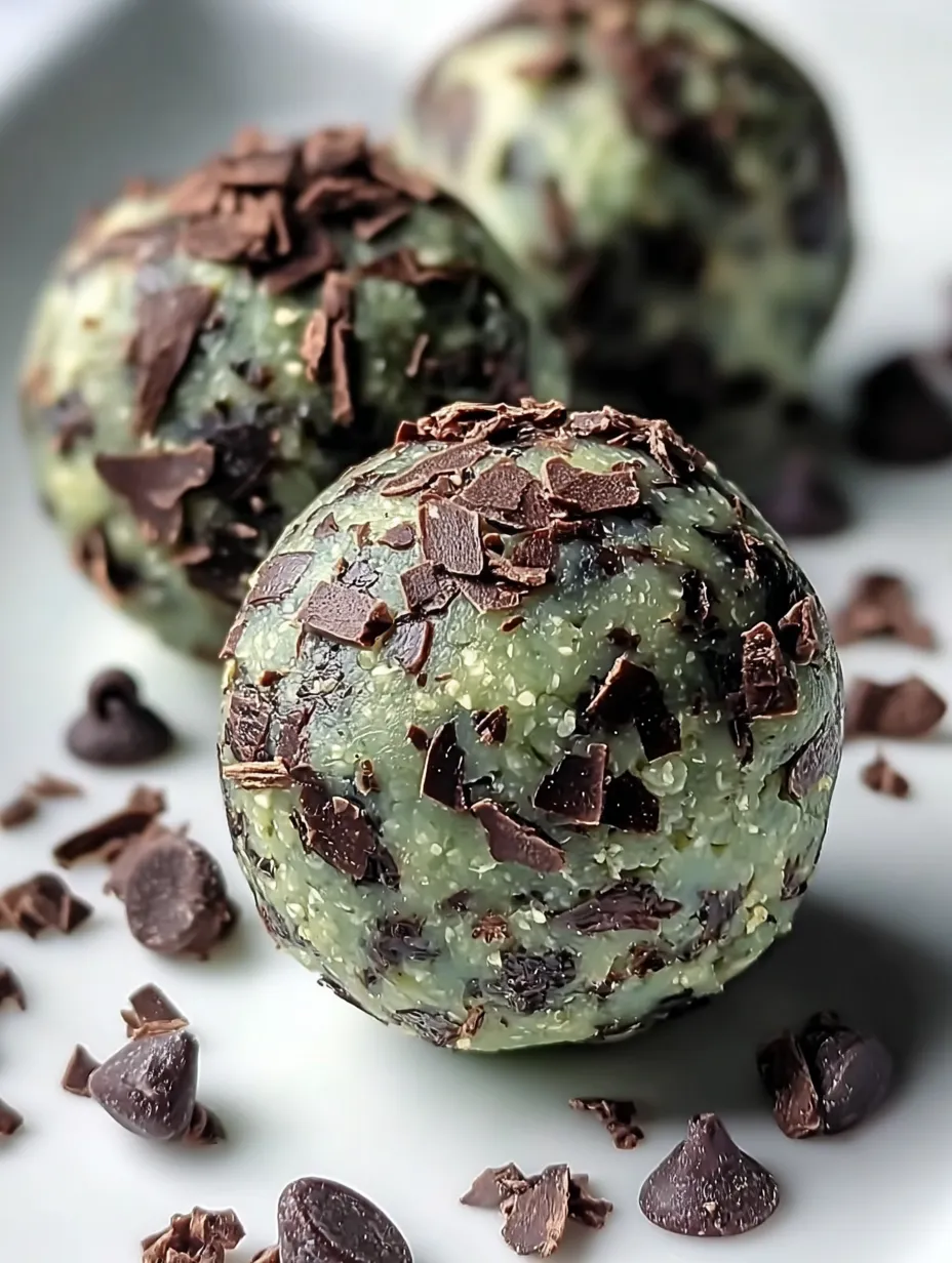 Two chocolate covered balls of chocolate.