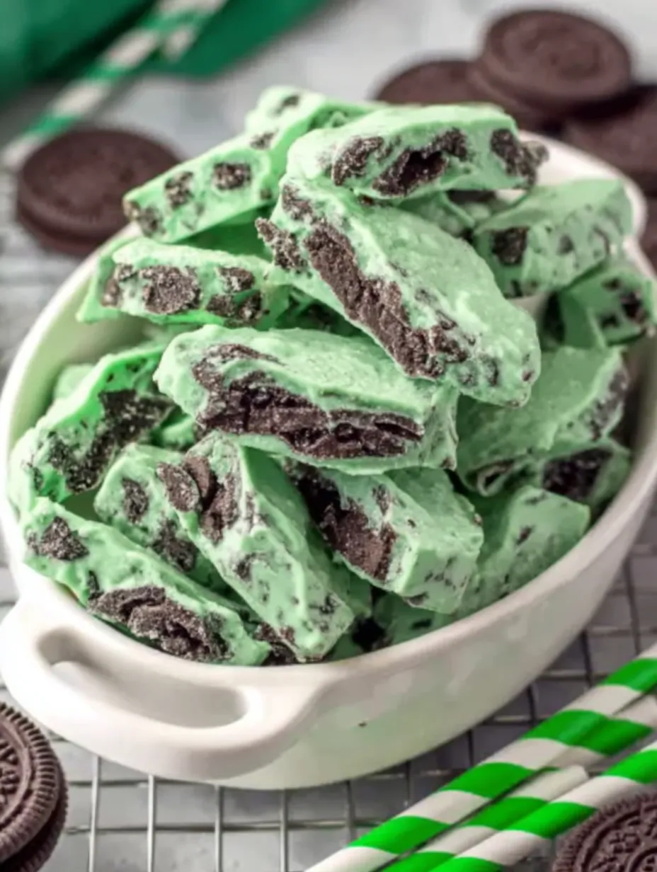 A bowl of green and brown candy.