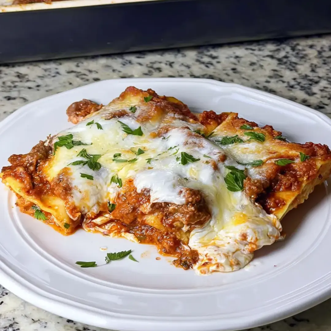 A white plate with a piece of food on it.