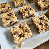 A plate of chocolate chip cookies with nuts.