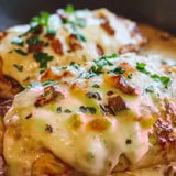 Chicken with cheese and herbs.
