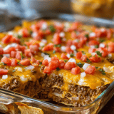 A dish of food with tomatoes and cheese.